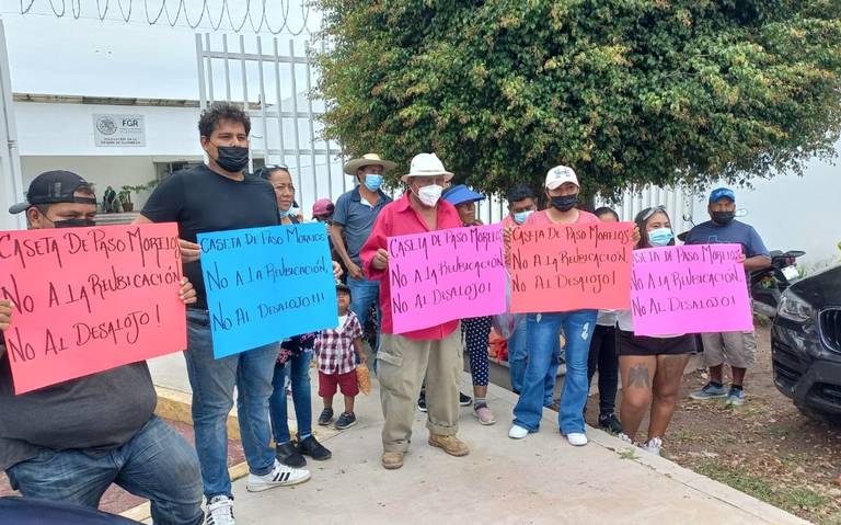 Denuncian comerciantes de caseta de Paso Morelos intento de desalojo de la FGR